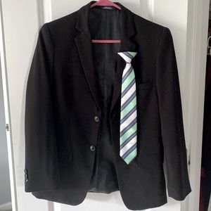 Black, chaps, youth 14 suit jacket and green tie. Both in very good condition.